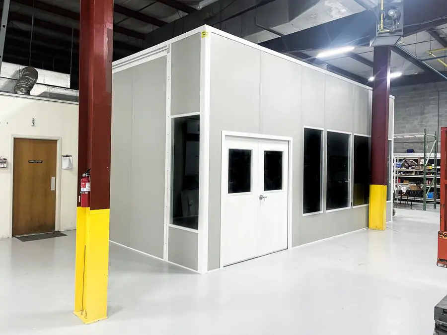 In-plant modular office with professional appearance inside active warehouse facility