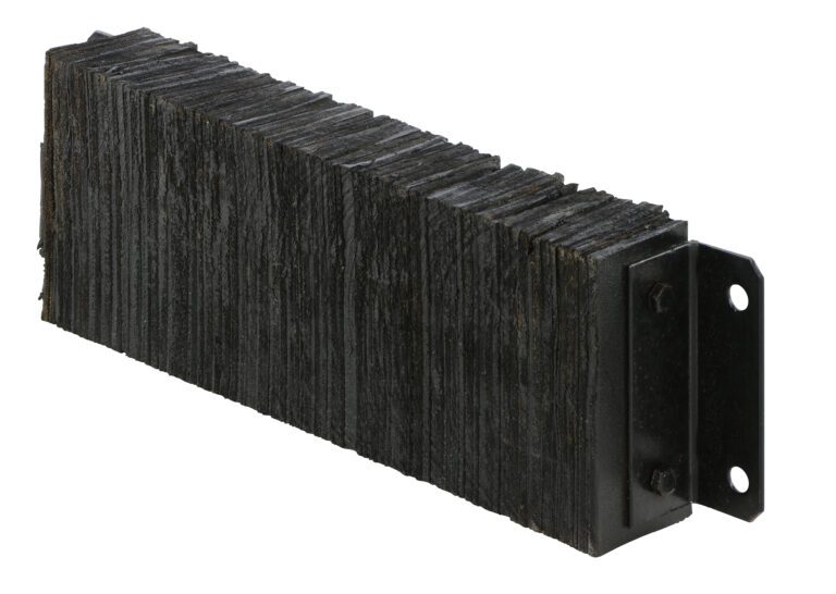 A detailed look at a black bristle brush with a metal mounting bracket, perfect for industrial or mechanical cleaning. Combine it with the Vestil Laminated Dock Bumper 10 X 30 X 4.5 In for added durability in challenging conditions.