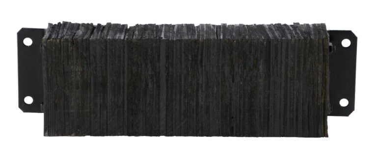 A stack of black rectangular graphite bars stands vertically between two textured black metal brackets with mount holes, similar to the Vestil Laminated Dock Bumper 10 X 30 X 4.5 In.