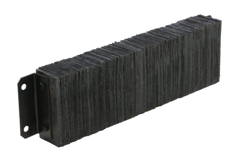 1036-4.5_A.jpg Resembling the Vestil Laminated Dock Bumper 10 X 36 X 4.5 In, a stack of rectangular black textured plates with visible layers along the edges is held by metal brackets on one side. The surface is rough, and the brackets have two holes for mounting.