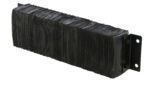 A close-up of a sturdy black brush resembles the durability of a Vestil Laminated Dock Bumper 10 X 36 X 6 In. Its metal base with mounting holes indicates its for attachment, while worn bristles add to its rugged charm.