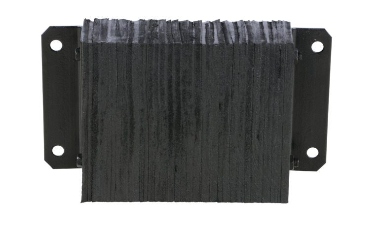 Close-up of a Rectangular Vestil Laminated Dock Bumper, black, 12 X 18 X 4.5 inches, with mounting plates on either side. It has textured horizontal grooves and four circular attachment holes on the plates.