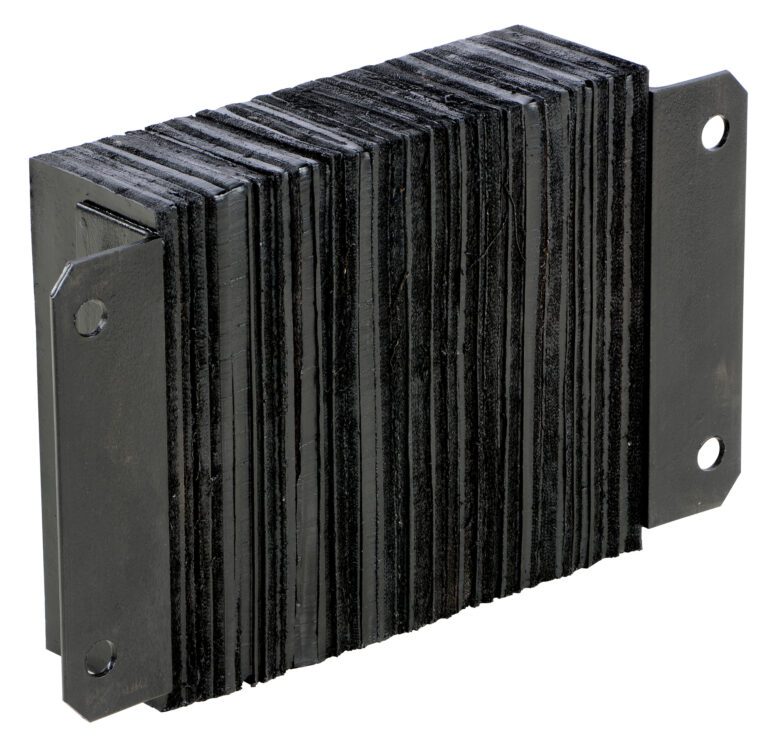 The Vestil Laminated Dock Bumper, sized 12 x 18 x 4.5 inches, is an industrial rubber mount with a layered black design. It features two side metal plates with mounting holes. Its textured surface suggests durability and flexibility.