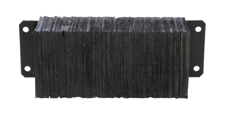 The Vestil Laminated Dock Bumper 12 X 24 X 4.5 In is a durable, black, textured rectangular block with a layered composition. Its mounted on a bracket featuring two circular mounting holes on each side, enhancing its functionality.