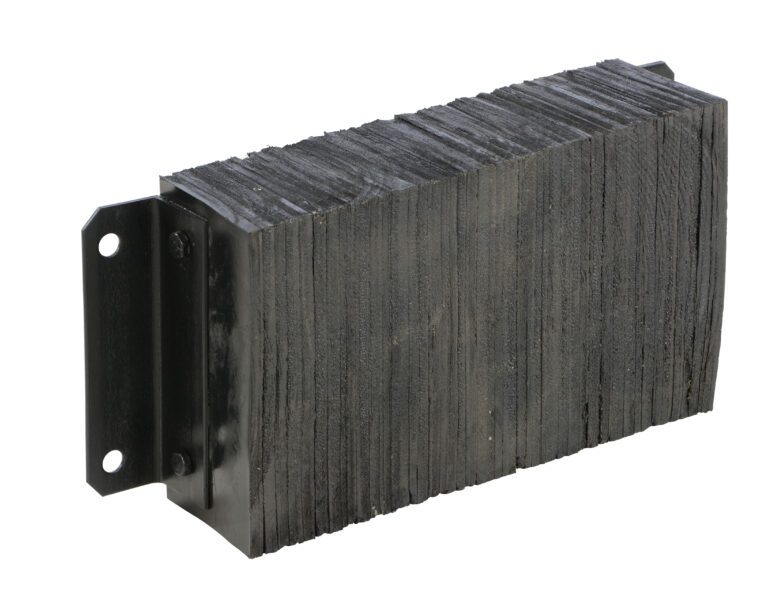 The Vestil Laminated Dock Bumper 12 x 24 x 6 In boasts a black rectangular rubber design with a textured surface, horizontal grooves, and two metal mounting brackets on the left side, making it ideal for industrial or vehicle use.