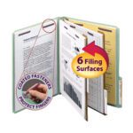 A hand inserts a page labeled Coated Fasteners Protect Fingers into a Smead Pressboard Classification File Folder with SafeSHIELD™ Fasteners, which features letter-size pages across six filing surfaces and includes 2 dividers in gray/green with a 2 expansion.