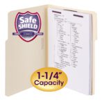 The Smead Extra-Capacity Manila Fastener Folder, with SafeSHIELD? Coated Technology and a 1/3-Cut Tab, features organized storage. It includes a purple and silver Safe Shield badge, a yellow oval indicating 1-1/4 capacity, suitable for Letter Size documents. Available in boxes of 50 (14575).
