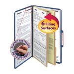 Image of a dark blue Smead Pressboard Classification File Folder with SafeSHIELD? Fasteners, highlighting six filing surfaces and featuring a side tab. A circular inset notes Coated fasteners protect fingers, while a bold yellow and red label announces 6 Filing Surfaces.