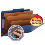 A Smead Pressboard Classification File Folder is shown open, featuring SafeSHIELD Fasteners, three dividers, six filing surfaces, and a 3 expansion. A close-up shows a hand using the fasteners. The label reads 6 Filing Surfaces and Coated Fasteners Protect Fingers & Documents. Comes in dark blue, legal size (10 per box).