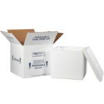 An open MH-USA 12 x 12 x 11 1/2 Insulated Shipping Kit with a detached white styrofoam cooler lid is beside a Perishable and This Side Up labeled cardboard box, expertly crafted for shipping and insulating perishable goods.