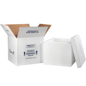 A white insulated box with its lid off is next to an open MH-USA 16 3/4 x 16 3/4 x 15 Insulated Shipping Kit cardboard box that has Perishable This Side Up and Rush Perishable Insulated instructions on it.