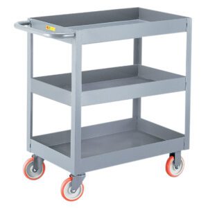 The gray utility cart, similar to the Little Giant 3-Inch Deep Shelf Truck, features a sturdy handle and red casters. Each of its three tiers has raised edges to keep items secure.