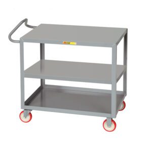 A gray, three-tiered utility cart with the innovative handle design from the Little Giant Ergonomic Shelf Truck stands on red and white wheels against a pristine white background.