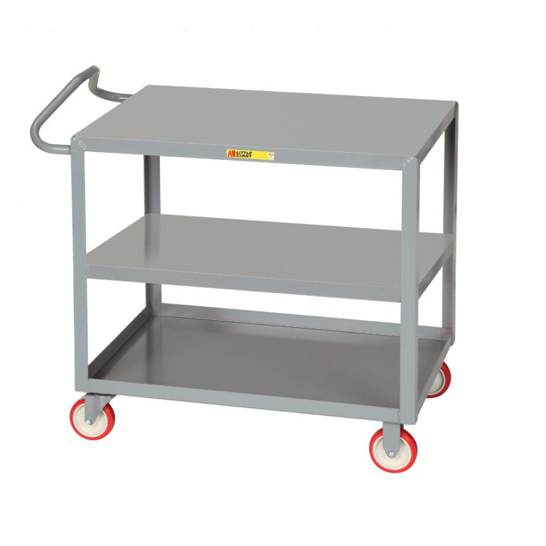 The Little Giant Ergonomic Shelf Truck, with its new handle design, is a gray three-tier utility cart on four red-and-white caster wheels. It stands empty against a plain white background, showcasing its sleek functionality.
