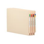 Four beige file folders are arranged side by side, each with a Smead ETS Color-Coded Month Label Sheet, Jan.-Dec., in assorted colors (67450), featuring months like December, October, and July with vibrant tabs displaying numbers and letters.