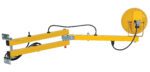 The Vestil Loading Light Adjusting Dbl Arm 40 Sodium is a yellow industrial hose reel with a mounted arm and coiled black cable, equipped with metal brackets for easy attachment, ensuring efficient cable management for workshop or industrial settings.