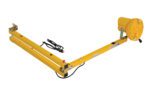 The industrial fan, like the yellow Vestil Loading Light Adjusting Dbl Arm 60 Sodium, is situated on a metal frame with a power cord. It features protective housing and sodium-bright design with a red button on top for ease of use, similar to an adjustable dbl arm mechanism.