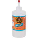 The 16 oz. Gorilla® Super Glue bottle, featuring the iconic orange label and Gorilla logo, includes a red-tipped nozzle for precise application. Weighing 1 lb (454 g), it is ideal for tough jobs.