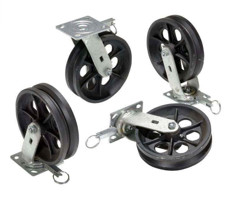 The image shows four black caster wheels featuring metal brackets and swivel plates, similar to Vestil Alum Gantry Crane V-Groove Wheels 8X2. Each has a black rubber rim, spoke design, and includes a locking mechanism and eye bolt.