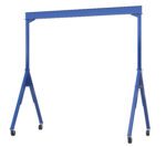 The Vestil Adj Height Steel Gantry Crane 6K 15 X 10 in blue features adjustable height, wheels for mobility, two A-frame supports, and a horizontal beam, making it ideal for lifting heavy loads in industrial settings.