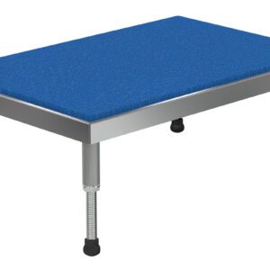The Vestil Adj Alum Stand 9.5-15.5 H 24 X 36 has a rectangular step stool design with a blue textured surface. It features four metal legs adjustable from 9.5 to 15.5 inches, each with a black rubber foot for stability, ensuring safety and flexibility in various settings.