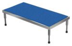 The Vestil Adj Alum Stand 9.5-15.5 H 24 X 48 boasts a robust metal table, textured blue mat, adjustable legs, and sturdy black rubber feet for enhanced stability.