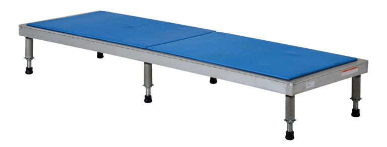 AHT-H-2472-A_A.jpg The Vestil Adj Alum Stand 9.5-15.5 H 24 X 72 is a rectangular metal platform with six adjustable legs (9.5 to 15.5) and a blue cushioned top divided into two sections, ideal for support or elevation in various applications.
