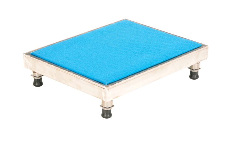 AHT-L-1924-A_A.jpg The Vestil Adjust Alum Stand 5.75-7.75 H 19X24 boasts a bright blue textured metal platform with four black rubber-tipped legs, providing a simple yet functional design suitable for versatile use against any backdrop.