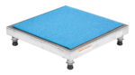 The Vestil Adjust Alum Stand 5.75-7.75 H 24X24 features a metal platform with a blue cushioned top and four adjustable legs. Its robust square design supports heavy items, and the rubber feet on the legs provide stability and prevent slipping.