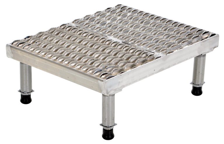 The Vestil Adj Alum Stand 9-1/2-15-1/2 H 19.12 X 23.75 offers a textured non-slip surface with four adjustable, rubber-tipped legs for enhanced stability, ensuring maximum safety and grip within the height range of 9-1/2 to 15-1/2 inches.