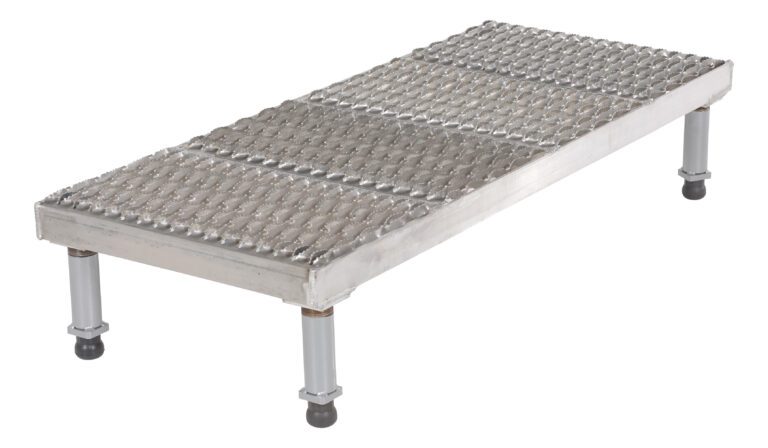 The Vestil Adjust Alum Stand 9/1/2-15/1/2 H 19.12 x 47.5 features a rectangular metal platform with a textured, non-slip surface and four sturdy legs with rubber feet for stability, adjustable from 9-1/2 to 15-1/2 inches in height for versatile use as a step or support in various settings.