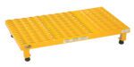 The Vestil Adj Work Mate Stand 6.75-8.75 H 19.56X35.25 has a yellow metal step platform with a grated surface for slip resistance, rubber feet on four legs for stability, and safety warnings on the sides.