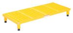 The yellow Vestil Adj Work Mate Stand (6.75-8.75 inches in height, 19.56x47 inches dimension) is a robust industrial platform with grated surface for traction and four sturdy black rubber-footed legs for stable elevated access in diverse work settings.
