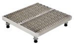 The Vestil Adj Alum Work Stand 5.75-7.75 H 23.62X24.12 has a square metallic platform with a wavy texture, can adjust from 5.75 to 7.75 inches in height, and features four adjustable legs with black rubber bases for stability.