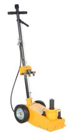 The Vestil Air-Powered Fork Truck Jack 44K 8.25 To 18.25 features a yellow hydraulic body, two large black wheels, and a long handle. Its vertical pole holds control levers with a coiled cable, while the sturdy base lifts heavy loads efficiently from 8.25 to 18.25 inches high.