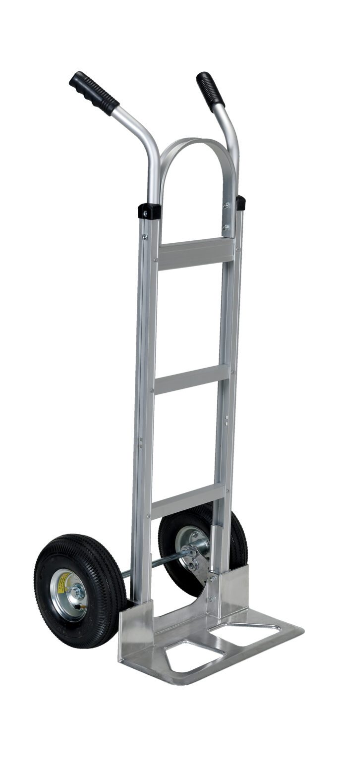 The Vestil Aluminum Hand Truck W/ Pneumatic Wheels has a silver frame, black handles, and an extendable flat base for easy loading. Its perfect for transporting heavy items, with two supports linking to the large wheels for stability.
