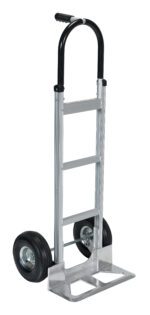 The Vestil Alum Pin Handle Hand Truck Pneumatic has a silver frame with a black handle, two large pneumatic rubber wheels, and a flat base platform perfect for carrying items. Its metal frame with riveted joints ensures durability.