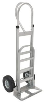 The Vestil Alum P-Handle Hand Truck Pneumatic Tires features a silver frame, two durable pneumatic tires, and a flat loading base. It includes a curved top handle and ladder-like supports for enhanced maneuverability and durability for various tasks.