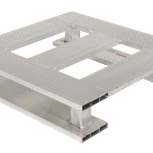 The Vestil Heavy Duty Aluminum Half Pallet Skid Bottom 24X24 boasts a sturdy, square slatted design with a durable metallic surface, reinforced by four strong horizontal beams and an open center, ideal for industrial use or transportation.