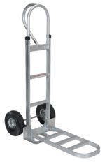 The Vestil Aluminum P-Handle Hand Truck Pneumatic has a curved handle, black pneumatic rubber wheels, and a foldable loading platform, making it perfect for easily transporting heavy items.