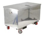 The Vestil Aluminum Tool Box-Casters/Forks 24 X 48 is a spacious, rectangular storage solution with a diamond plate design and hinged lid, featuring robust metal handles and four red casters for easy mobility.