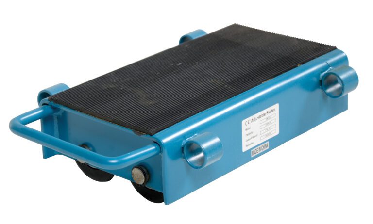 The Vestil Machinery Skates Adjust 12 Ton Capacity is a blue industrial dolly with a textured black surface, two visible small wheels, and a side handle for maneuvering heavy items. It includes a label with specs.