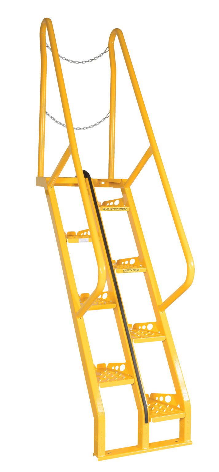 The Vestil Alternate Tread Stair 56 Degree 60 In is yellow metal, has side railings, perforated steps, a 56-degree incline, and measures 60 inches. Its ideal for industrial use with a safety chain at the top and reinforced central support beam.
