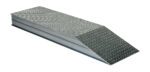 The Vestil Heavy Duty Alum Wheel Riser has a metallic ramp with a diamond plate surface and rectangular base, connecting to the incline. Its textured top shines against a white background, showcasing its durable build.