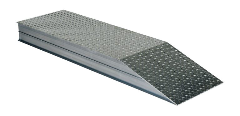 ATWR-18-8-54_A.jpg The Vestil Heavy Duty Alum Wheel Riser 18X7.87X54 includes an aluminum ramp with a diamond plate surface, offering a sloped incline and rectangular base ideal for vehicle or equipment access, featuring a metallic finish with visible joint seams.