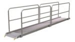 The Vestil Alum Walk Ramp Handrail Hook, measuring 193.12 x 28 inches, features a portable silver design with dual railings and a textured surface for secure grip. Ideal for wheelchairs or carts, it enhances accessibility with an elevated ramp and slight upward slope at the entrance.