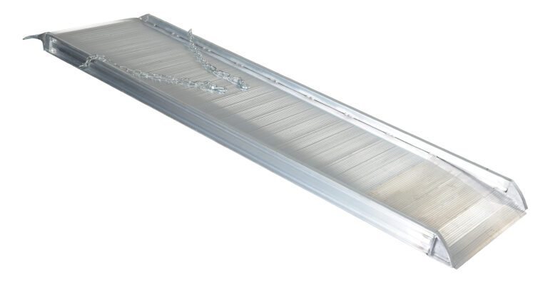 AWR-28-8A_A.jpg The Vestil Alum Walk Ramp Overlap Style 96 X 28 In features a silver metallic finish with a ribbed surface, raised edges for stability, and a chain attached at one end for securing. It slightly narrows at the top.