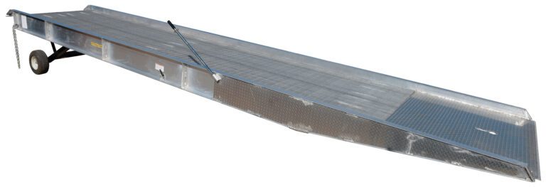 AY-257230_A.jpg The Vestil Aluminum Yard Ramp 25K Lb 74W x 360L In features a grated surface, hydraulic lift support, and black wheels for easy maneuvering. Its gentle incline to a flat top is ideal for efficiently loading vehicles or equipment.