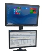 Two computer monitors are stacked vertically in a sleek laboratory design. The top monitor displays a Windows desktop with various application tiles, while the bottom showcases a spreadsheet filled with columns and rows of text and numbers.