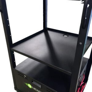 A black multi-tiered rolling cart with shelves, featuring a logo reading Newcastle Systems at the bottom. It has green wheels and red cables neatly coiled on one side.